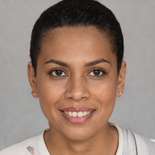 Joyful white young-adult female with short  black hair and brown eyes