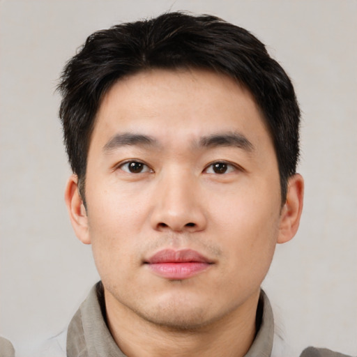 Neutral asian young-adult male with short  black hair and brown eyes