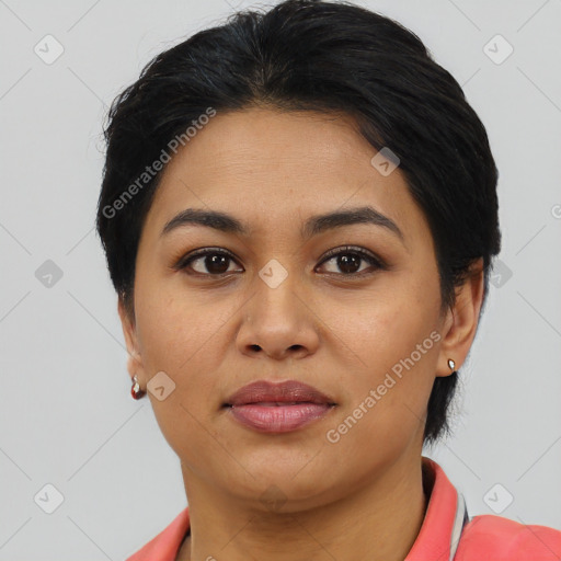 Joyful asian young-adult female with short  black hair and brown eyes