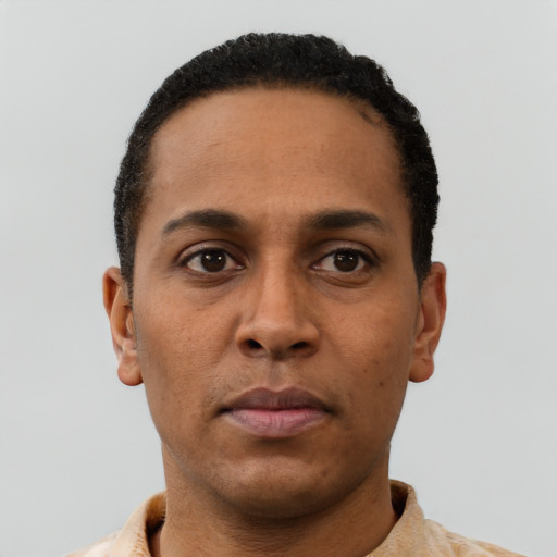 Neutral black young-adult male with short  black hair and brown eyes