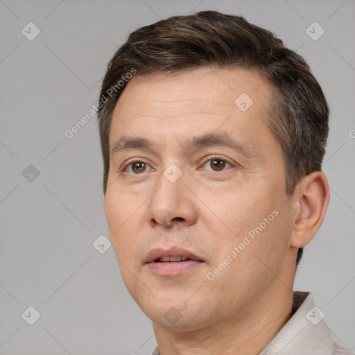 Neutral white adult male with short  brown hair and brown eyes