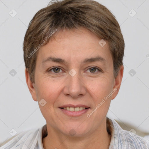 Joyful white adult female with short  brown hair and brown eyes