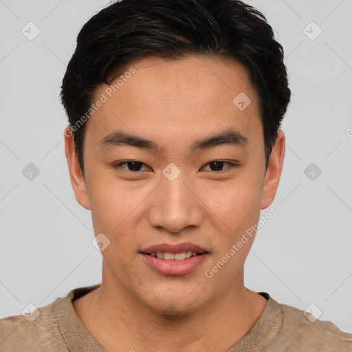 Joyful asian young-adult male with short  brown hair and brown eyes