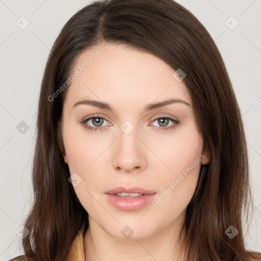 Neutral white young-adult female with long  brown hair and brown eyes