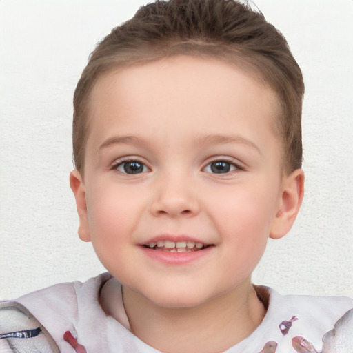 Joyful white child female with short  brown hair and blue eyes