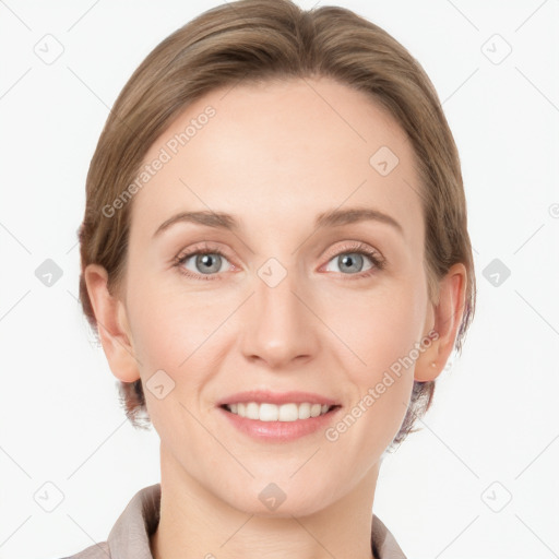 Joyful white young-adult female with medium  brown hair and grey eyes