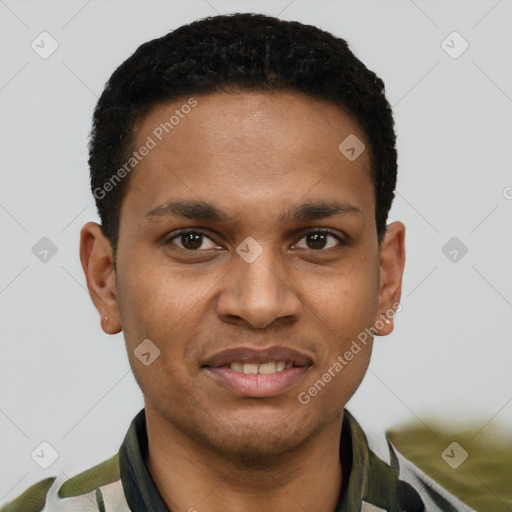 Joyful black young-adult male with short  brown hair and brown eyes