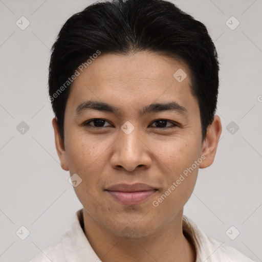 Joyful asian young-adult male with short  black hair and brown eyes