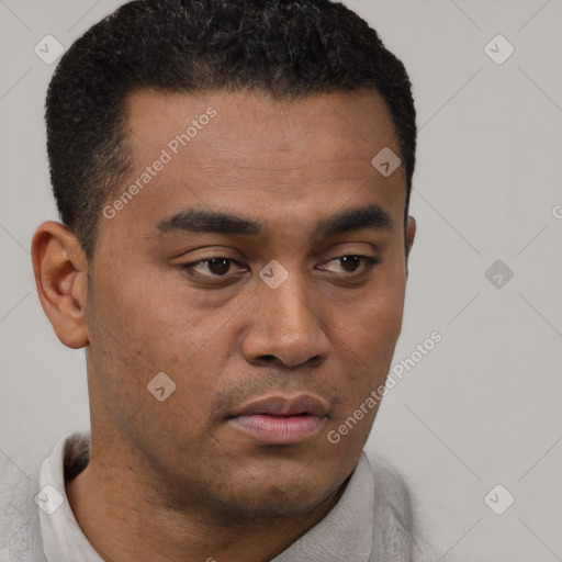 Neutral latino young-adult male with short  black hair and brown eyes