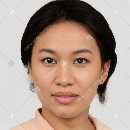 Joyful asian young-adult female with medium  brown hair and brown eyes