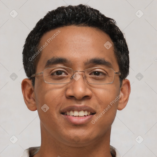 Joyful latino young-adult male with short  black hair and brown eyes