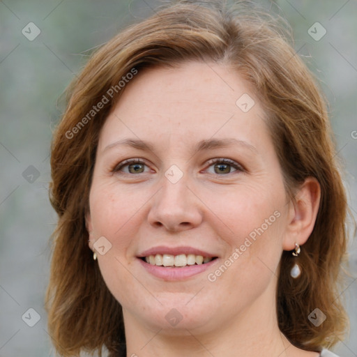 Joyful white young-adult female with medium  brown hair and green eyes