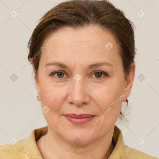 Joyful white adult female with short  brown hair and brown eyes