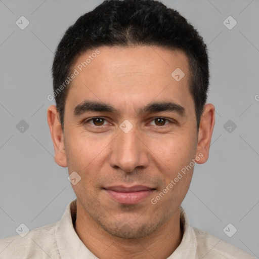 Joyful white young-adult male with short  black hair and brown eyes