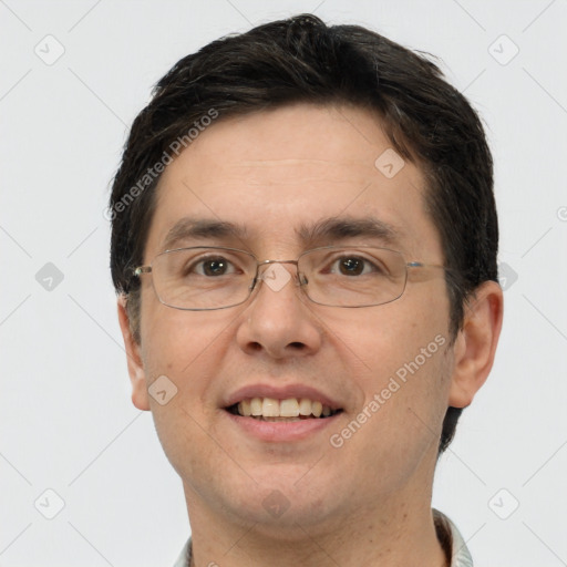 Joyful white adult male with short  brown hair and brown eyes