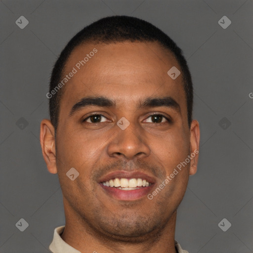 Joyful black young-adult male with short  brown hair and brown eyes