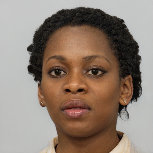 Neutral black young-adult female with short  brown hair and brown eyes