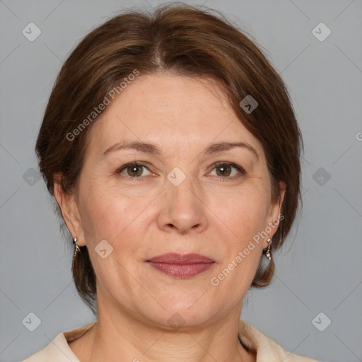 Joyful white adult female with medium  brown hair and grey eyes