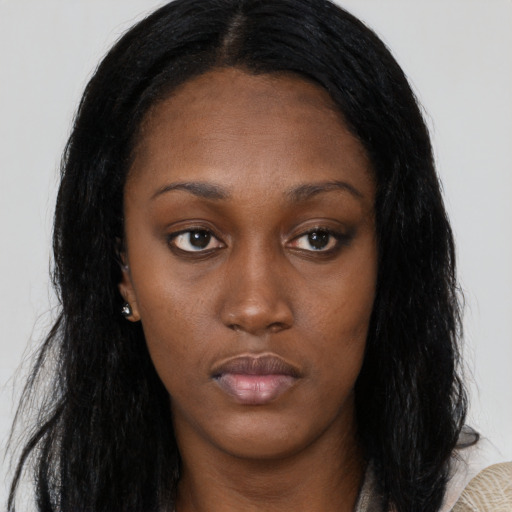 Neutral black young-adult female with long  black hair and brown eyes