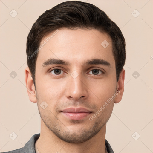 Neutral white young-adult male with short  brown hair and brown eyes