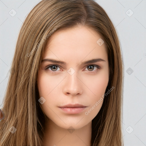 Neutral white young-adult female with long  brown hair and brown eyes