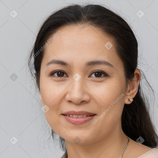 Joyful white young-adult female with medium  brown hair and brown eyes