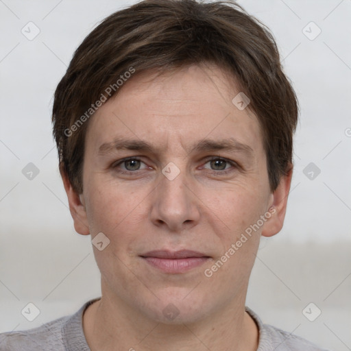 Joyful white adult male with short  brown hair and grey eyes