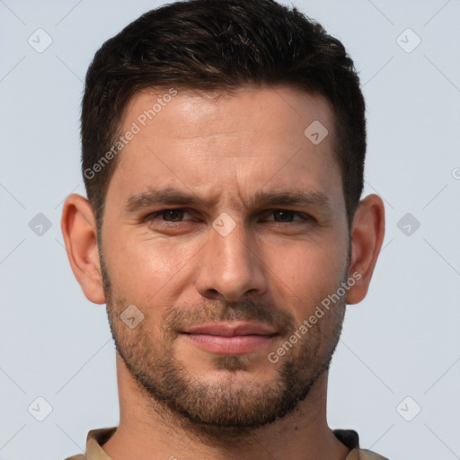 Joyful white young-adult male with short  brown hair and brown eyes