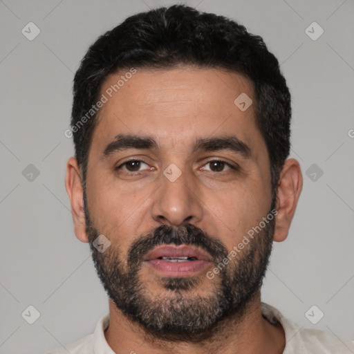 Neutral latino adult male with short  black hair and brown eyes
