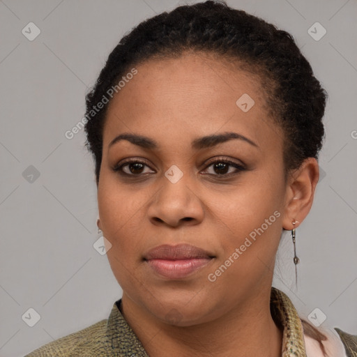 Joyful black young-adult female with short  brown hair and brown eyes