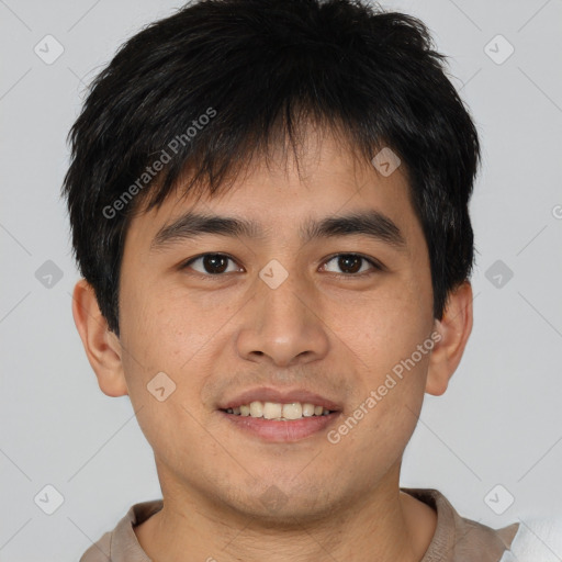 Joyful asian young-adult male with short  brown hair and brown eyes