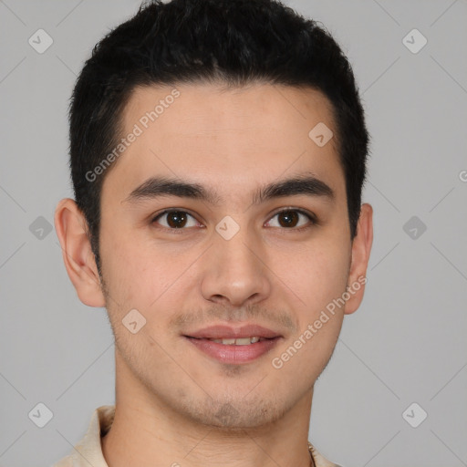 Joyful latino young-adult male with short  brown hair and brown eyes