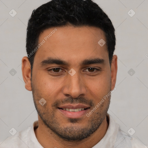 Joyful latino young-adult male with short  black hair and brown eyes