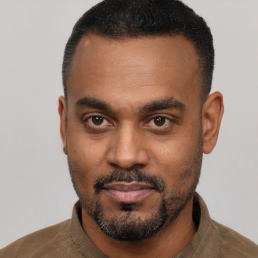Neutral black young-adult male with short  black hair and brown eyes
