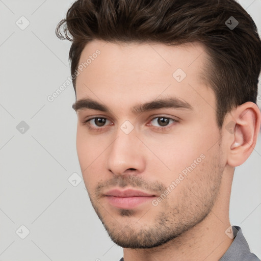 Neutral white young-adult male with short  brown hair and brown eyes