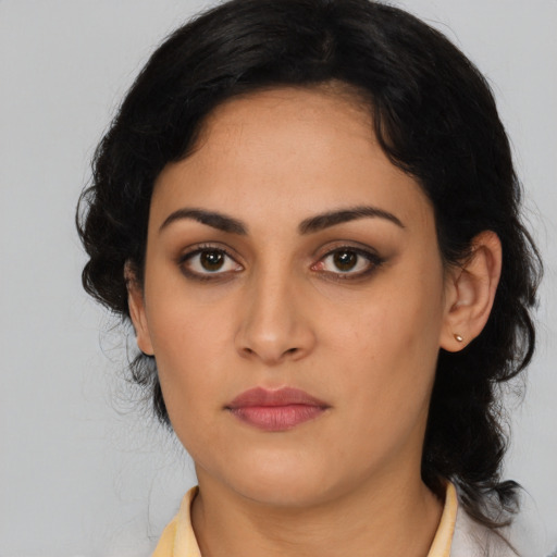 Neutral latino young-adult female with long  black hair and brown eyes