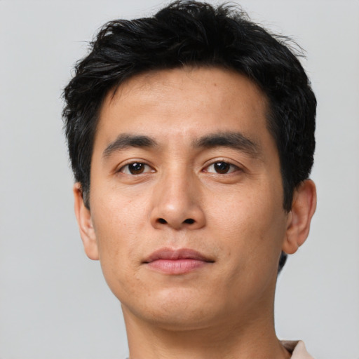 Neutral asian young-adult male with short  black hair and brown eyes
