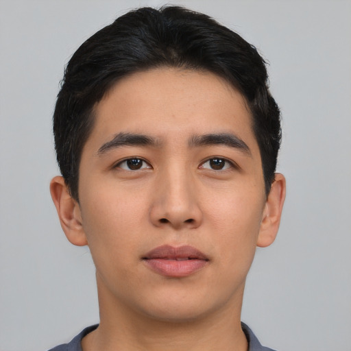 Neutral asian young-adult male with short  brown hair and brown eyes