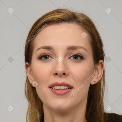 Joyful white young-adult female with long  brown hair and grey eyes