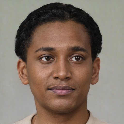 Neutral black young-adult male with short  black hair and brown eyes