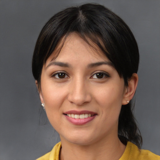 Joyful asian young-adult female with medium  brown hair and brown eyes