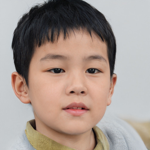 Neutral asian child male with short  brown hair and brown eyes
