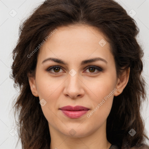 Joyful white young-adult female with long  brown hair and brown eyes