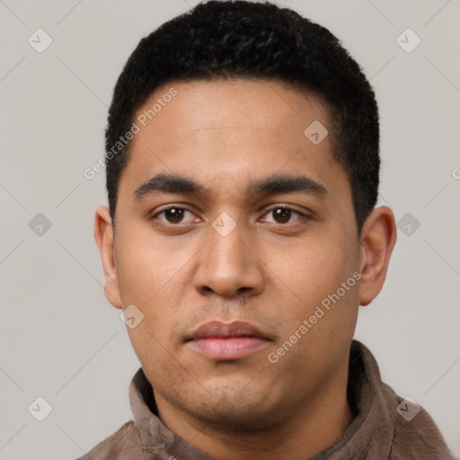 Neutral latino young-adult male with short  black hair and brown eyes