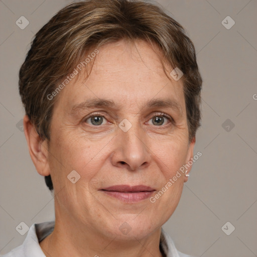 Joyful white adult female with short  brown hair and grey eyes