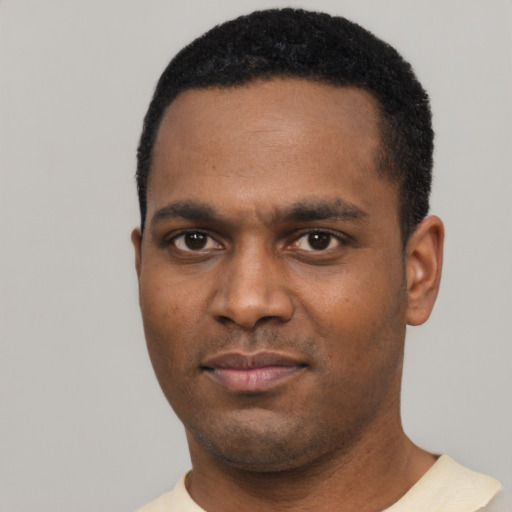 Neutral black young-adult male with short  black hair and brown eyes