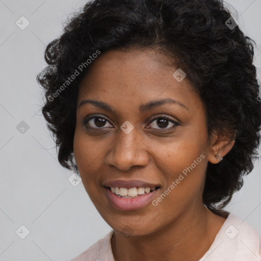 Joyful black young-adult female with long  brown hair and brown eyes