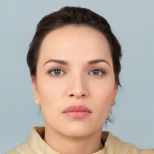 Neutral white young-adult female with medium  brown hair and brown eyes