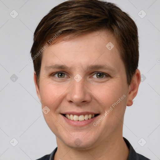 Joyful white young-adult female with short  brown hair and grey eyes