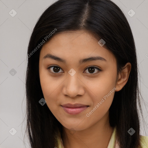 Joyful latino young-adult female with long  brown hair and brown eyes